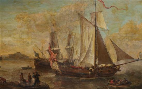 An 18th century oil on canvas of shipping figures in a harbour, 52 x 82cm